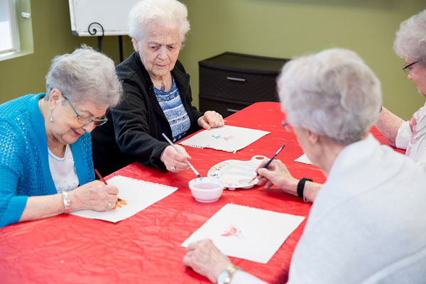 Senior citizens painting competition at Queens Avenue Retirement Residence